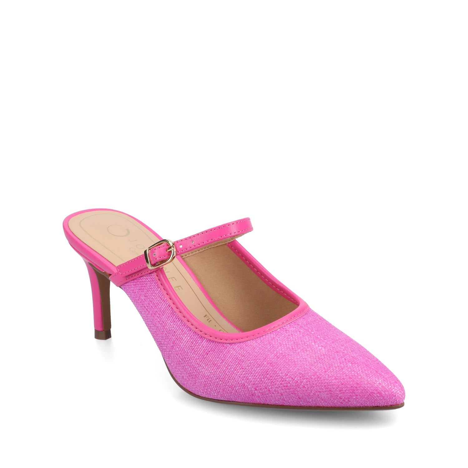 Close-up of tan suede pointed-toe slingback heels paired with cropped blue jeans, with legs playfully lifted in the air.