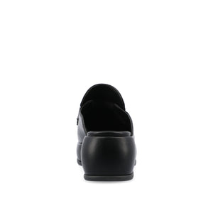 ANTONINA MULED FLATS IN FAUX LEATHER